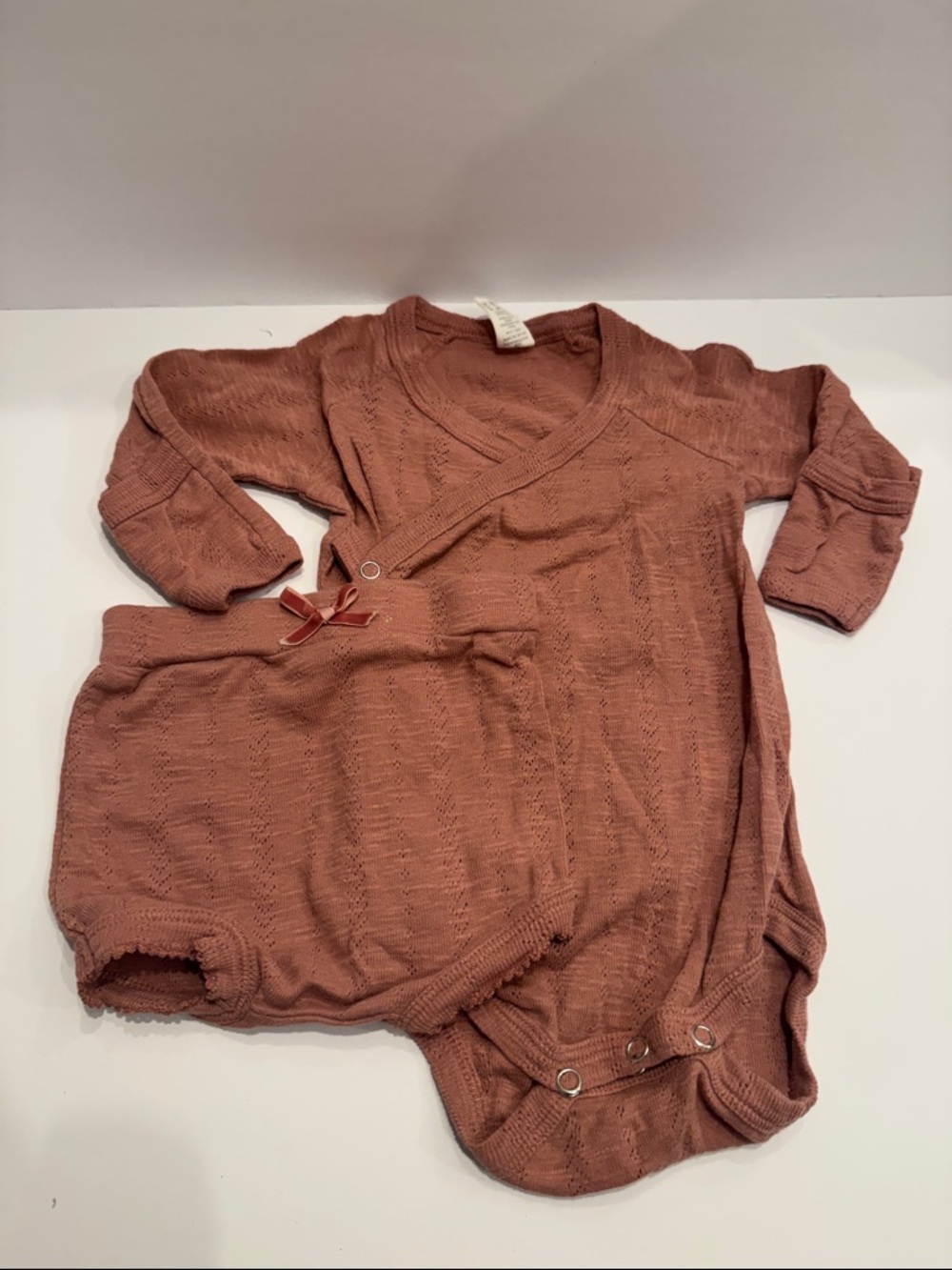 Kate Quinn Pointelle Knit Baby onesie and bummie shorts set